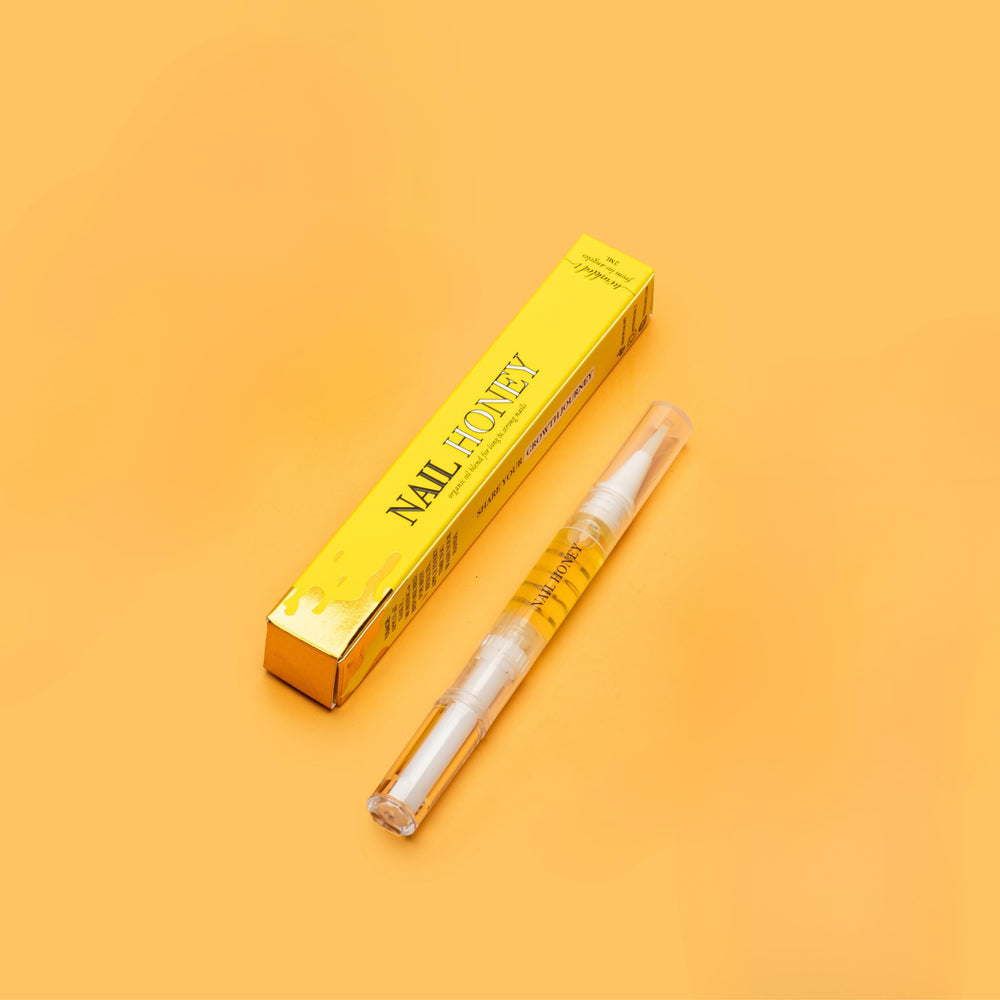 Twinkled T pen tucked in purse depicting on-the-go nail care advantage