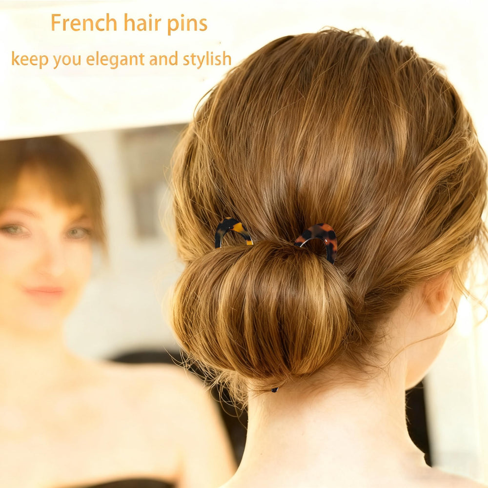 Twoheadpig pin tucked under an updo showing hidden finish for polished look benefit