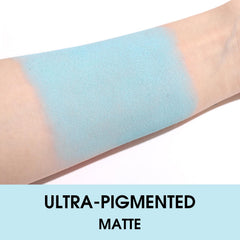 UCANBE brush applying eyeshadow showing intense pigment payoff benefit