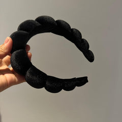Uchyius headband in use styling on model adding polished look benefit