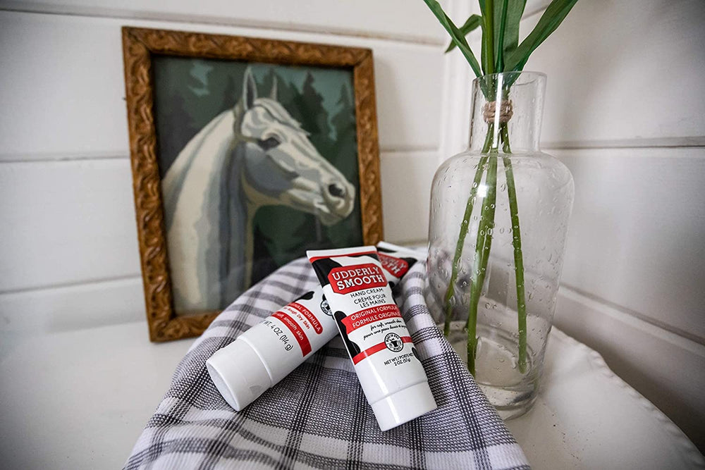 Udderly Smooth tubes on a bathroom counter showing everyday accessibility benefit