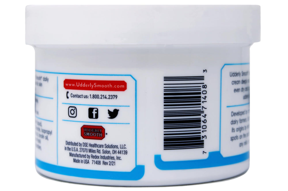 Udderly Smooth open jar showing creamy texture that absorbs quickly