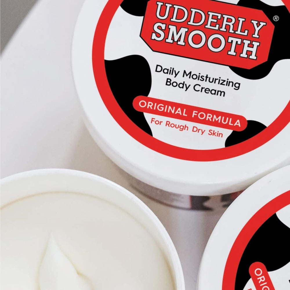 Udderly Smooth cream spread on skin demonstrating smooth, hydrated finish