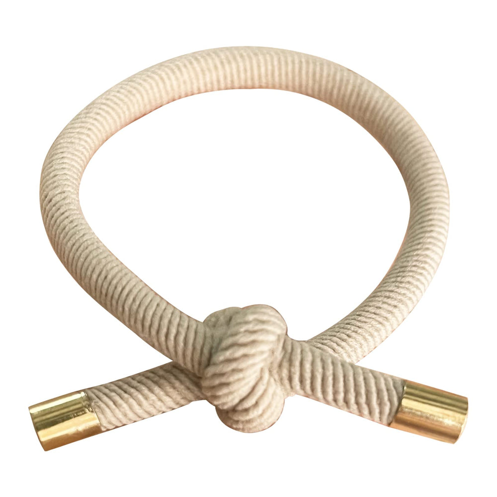 UDeBe close-up of knot and elastic texture highlighting gentle grip