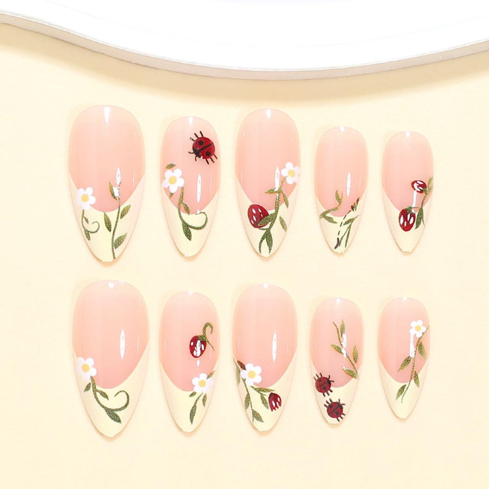 UEYRSEDB hand applying press-on nail demonstrating quick application and time-saving benefit