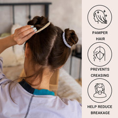 Uisgong scrunchie styled on ponytail, sleek look and reduced frizz benefit