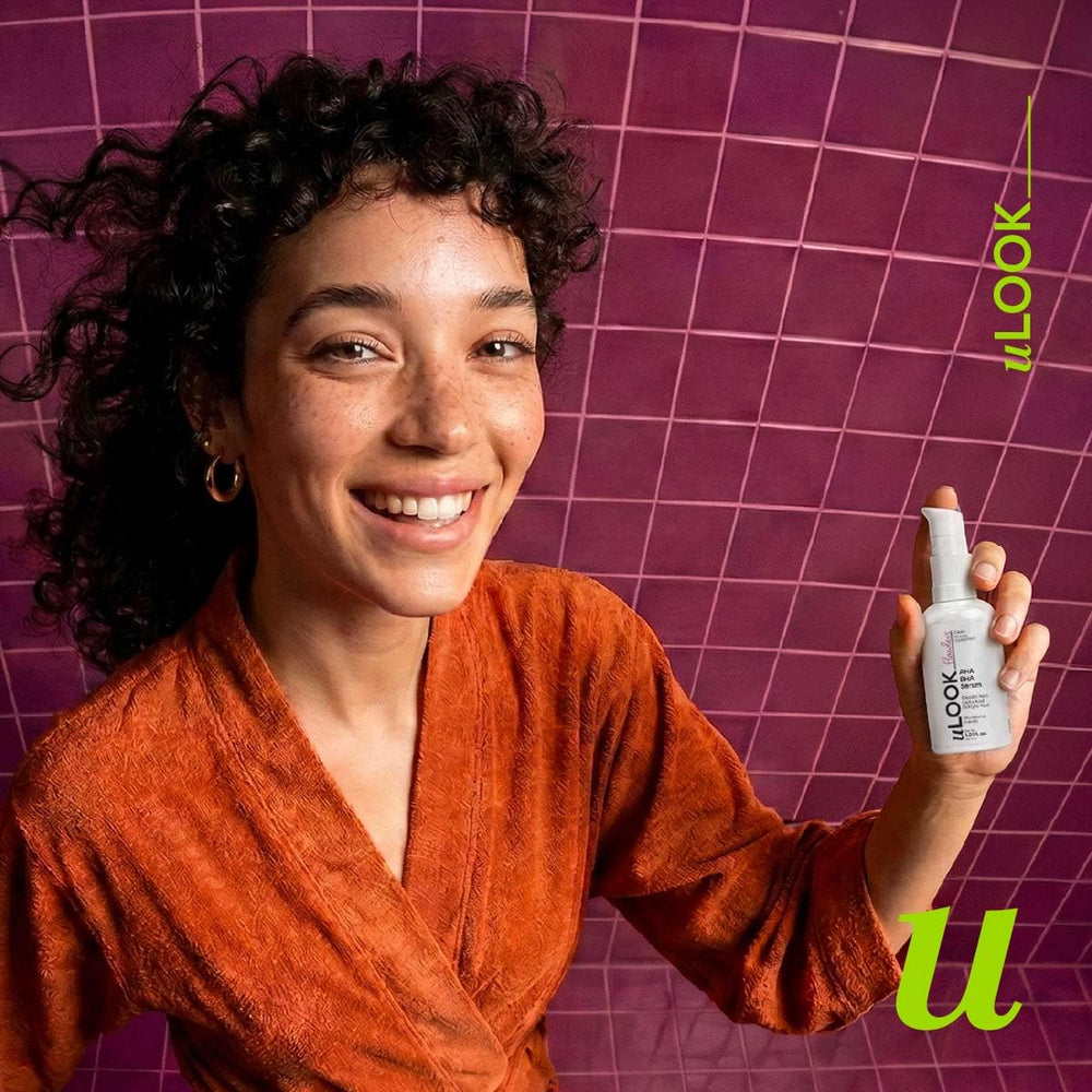 uLOOK dropper dispensing serum showing smooth lightweight texture