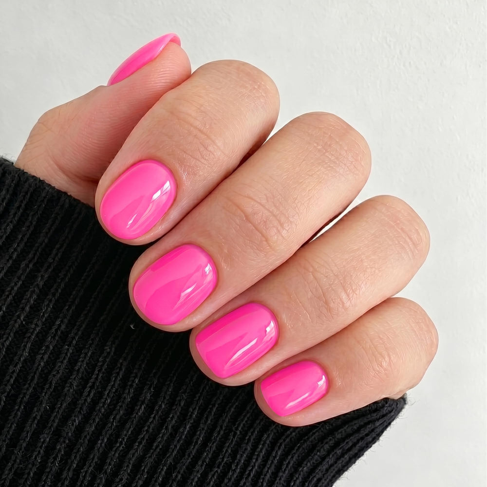 UNA GELLA front packaging showing neon hot pink nails and kit benefits