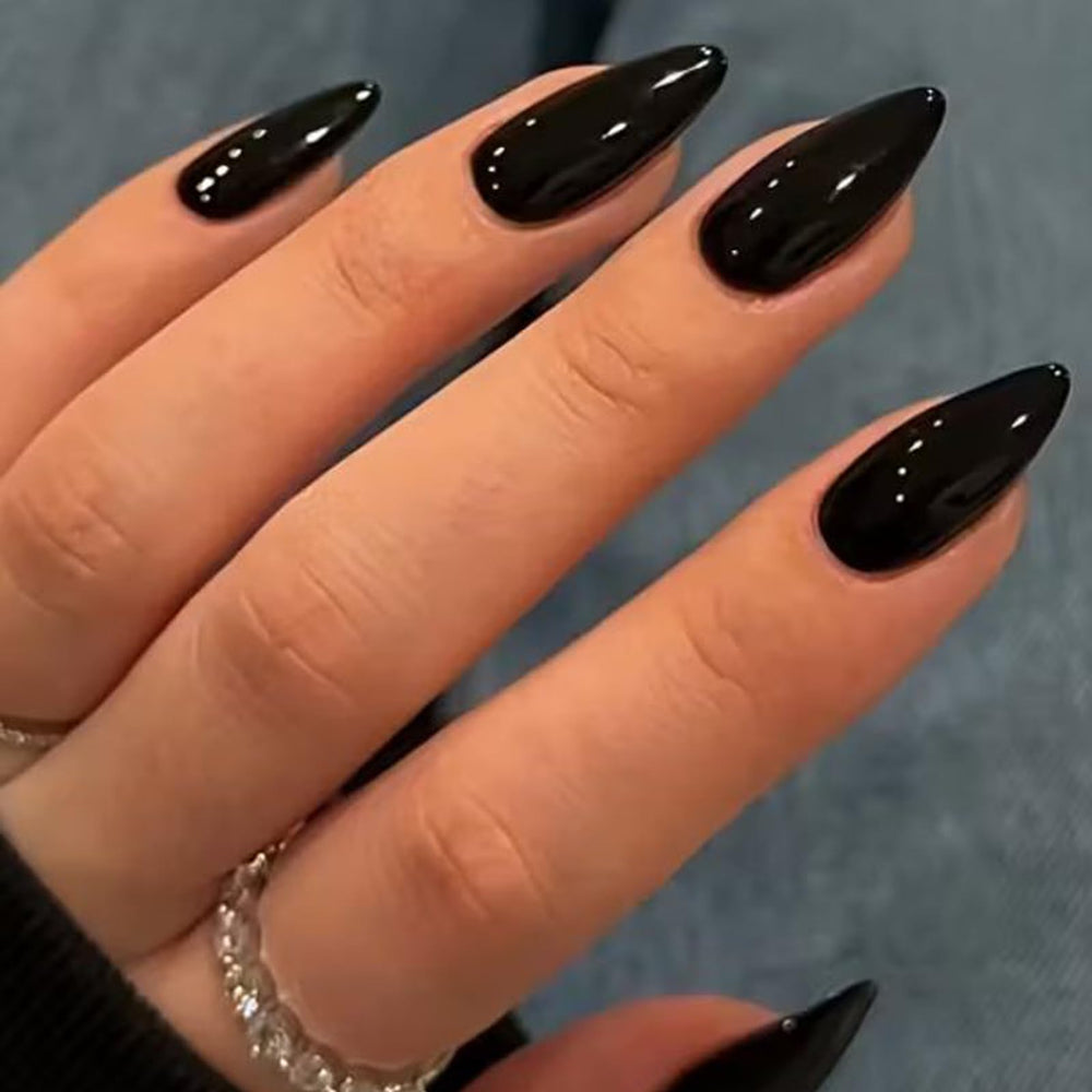 UNA GELLA front packaging showing glossy black press-on nails and kit benefits