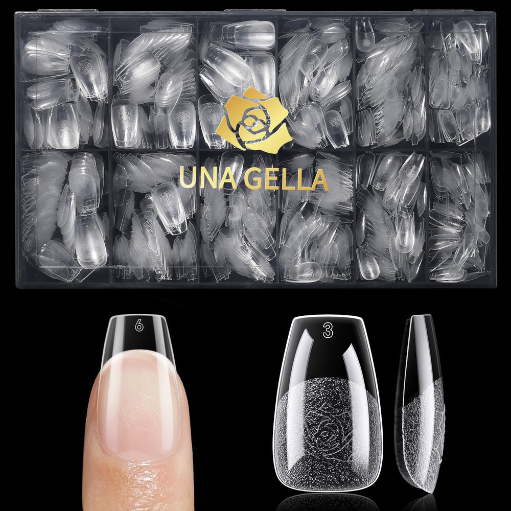 UNA GELLA finished manicure on hands highlighting short coffin style and polished results