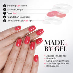 UNA GELLA short square red nails worn casually, classic polished finish