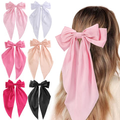 Unbednigt front view of six pink satin bows showing elegant styling and set cohesion