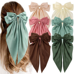 Unbednigt front view of six green bow clips showing coordinated set benefit