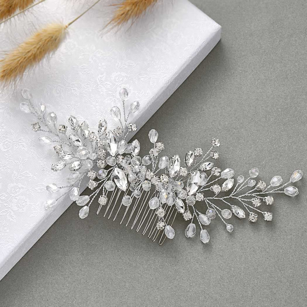 Unicra comb placed in a bridal updo adding visible sparkle for photos