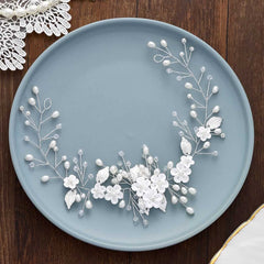 Unicra close-up of pearl and metal flower detail highlighting craftsmanship and sparkle