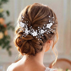 Unicra hair vine worn in an elegant bridal updo adding subtle sparkle