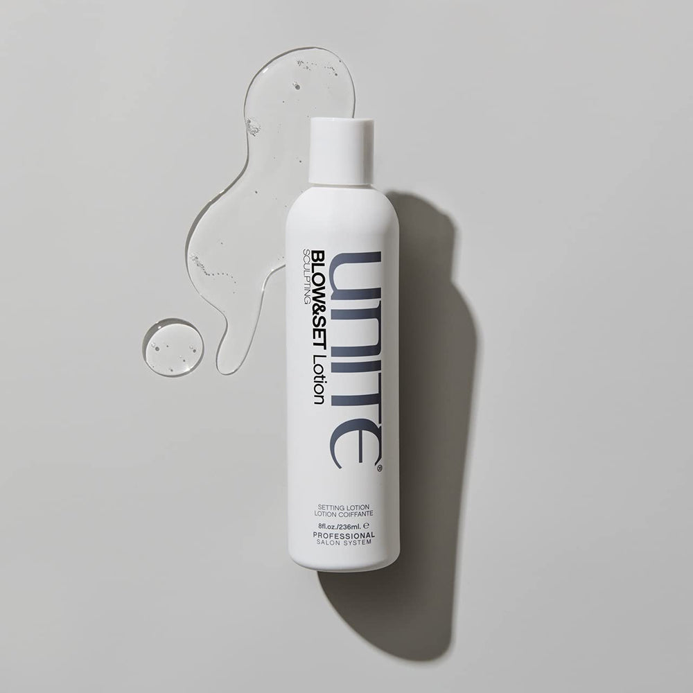 UNITE BLOW&SET bottle next to ruler showing the 8 fl oz size for reference