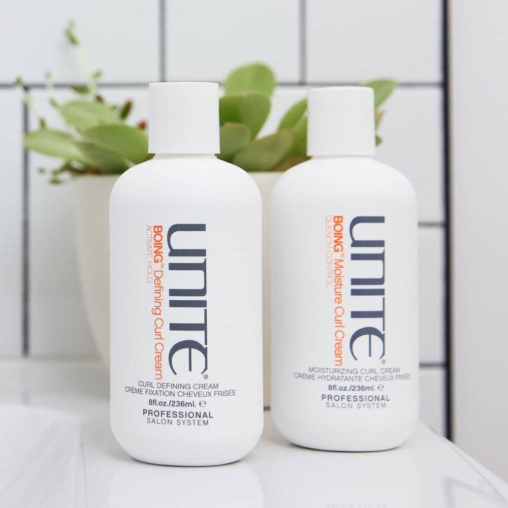 UNITE BOING jar in hand showing 8 fl oz scale for easy sizing reference