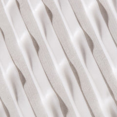 UNITE LAZER texture on hand to show lightweight cream consistency and smooth finish