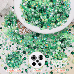 uotey rhinestones applied on nails showcasing polished green accents