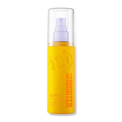 Urban Decay front bottle showing glow finish and long-wear benefit