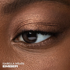 Urban Decay Ember pan close-up revealing metallic copper pigment and smooth finish