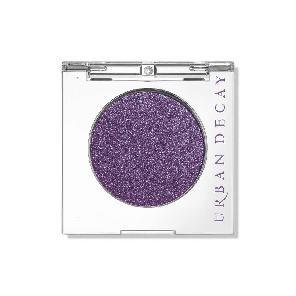 Urban Decay front compact deep purple shimmer shows product and packaging benefit vivid color