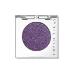 Urban Decay front compact deep purple shimmer shows product and packaging benefit vivid color