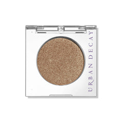 Urban Decay compact front showing Half Baked gold shade and sleek packaging benefit portability