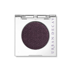 URBAN DECAY Ride front pan showing deep brown shimmer and purple shift benefit vivid pigment