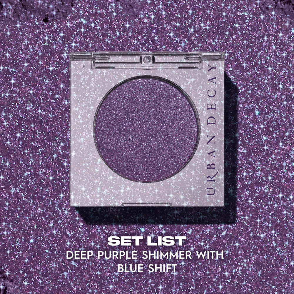 Urban Decay swatch on skin showing deep purple with blue shift for dimensional color