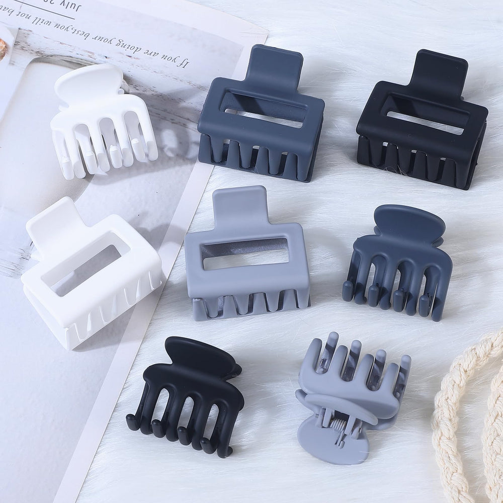 USDNICE clips held in hand to show compact size and easy portability