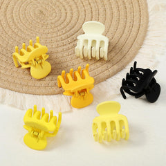 USDNICE clips held in hand showing compact size benefit