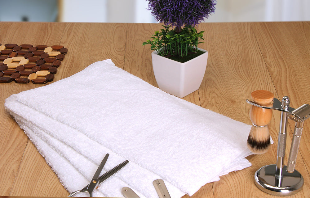 Utopia Towels arranged in spa setting conveying clean professional ambiance