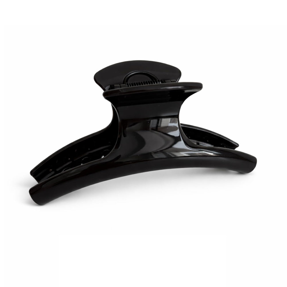 UVANKAUP front view of black jumbo claw clip showing clean shape and benefit of secure hold