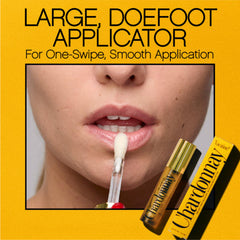 VACATION Chardonnay lip oil on lips lifestyle shot adding shine and subtle plump look