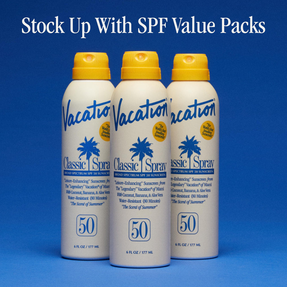 VACATION bottle on beach towel evoking outdoor sun protection