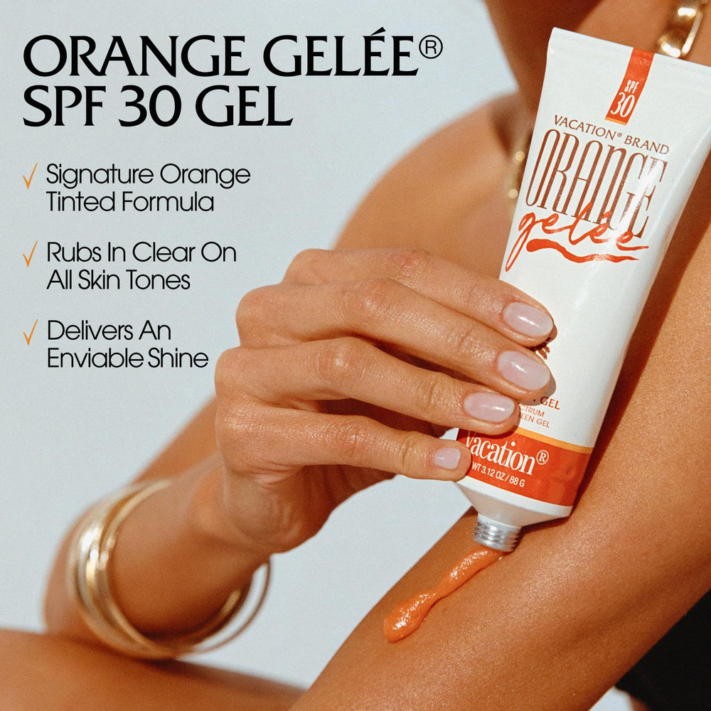 VACATION spray oil canister sprayed for even glossy SPF coverage