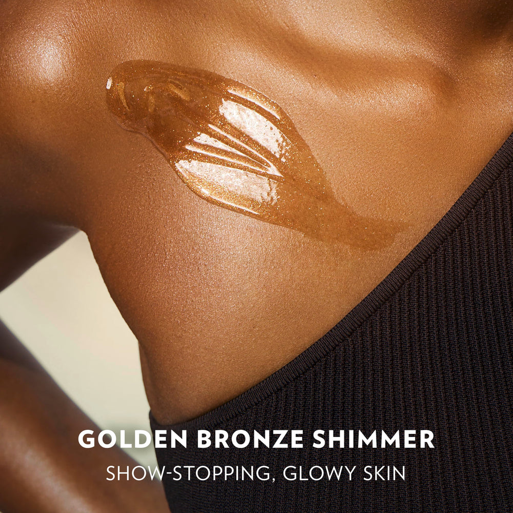 Vaseline shimmer swatch on skin illustrating light-reflecting bronze glow