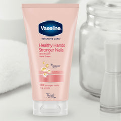 size comparison of Vaseline hand cream tubes beside a hand to show travel-friendly 3.4 oz