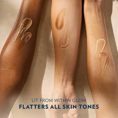 Vaseline on arms and legs catching sunlight for luminous skin