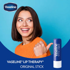 Vaseline sticks in a purse pocket showing portable lip care on the go
