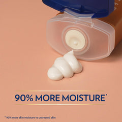 Close-up of Vaseline lotion texture showing creamy cocoa butter moisture