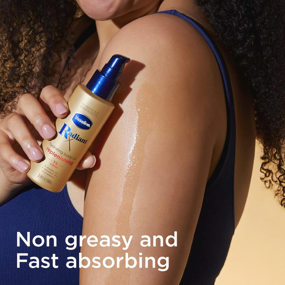 Vaseline radiant x being applied on hand for instant softening benefit
