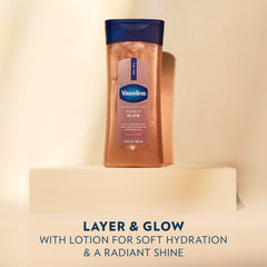 Vaseline applied to shoulders and collarbones creating subtle shine