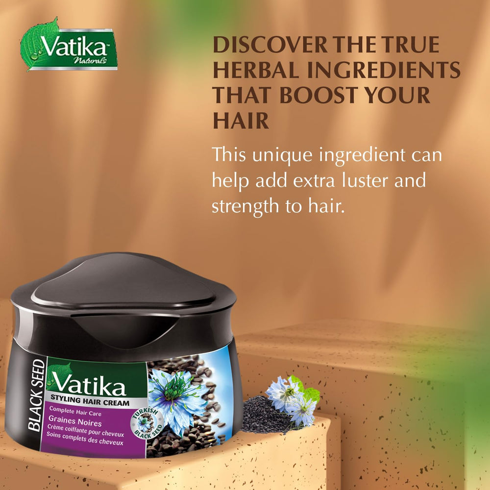 Vatika Naturals cream on hands ready to apply, helps detangle and define curls