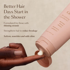 VEGAMOUR applying conditioner in shower demonstrating smoothing action