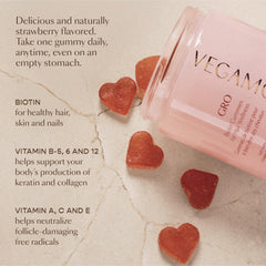 VEGAMOUR gummies arranged with strawberries to show natural flavor and enjoyment