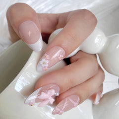 VELINNA side profile of medium almond nails demonstrating flattering silhouette