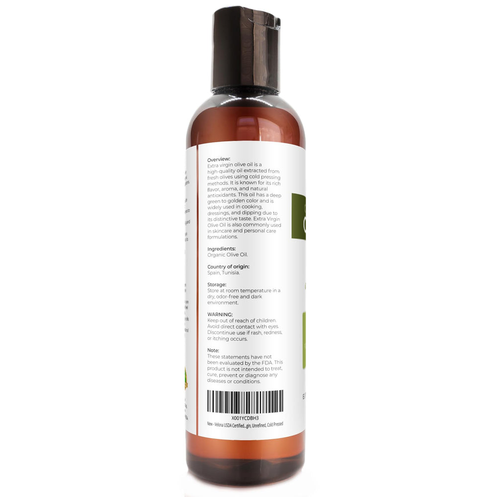velona close-up oil texture on spoon, shows cold-pressed smoothness